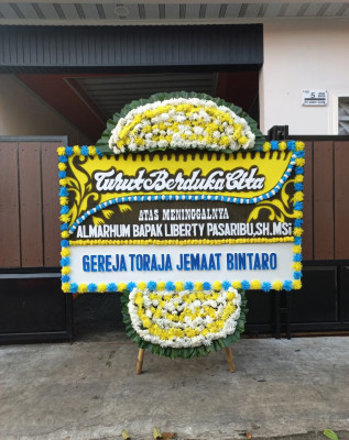 Papan Bunga Duka di Wukirharjo